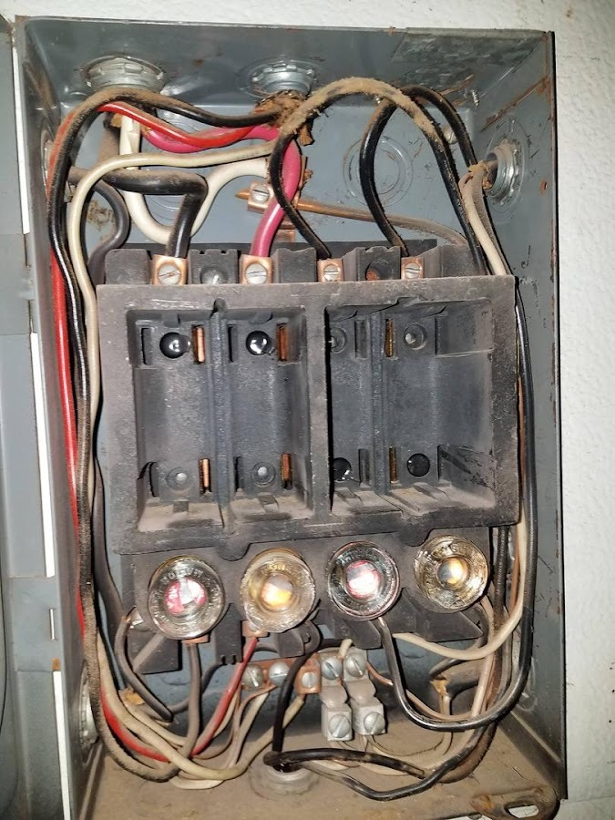 Old fuse panel in a Northeast Ohio home that may need an electrical panel upgrade